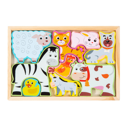 Set of wooden animal puzzles in a box on a white background