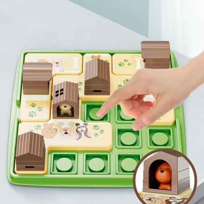 Children's puzzle toy with animal houses and a hand interacting with it