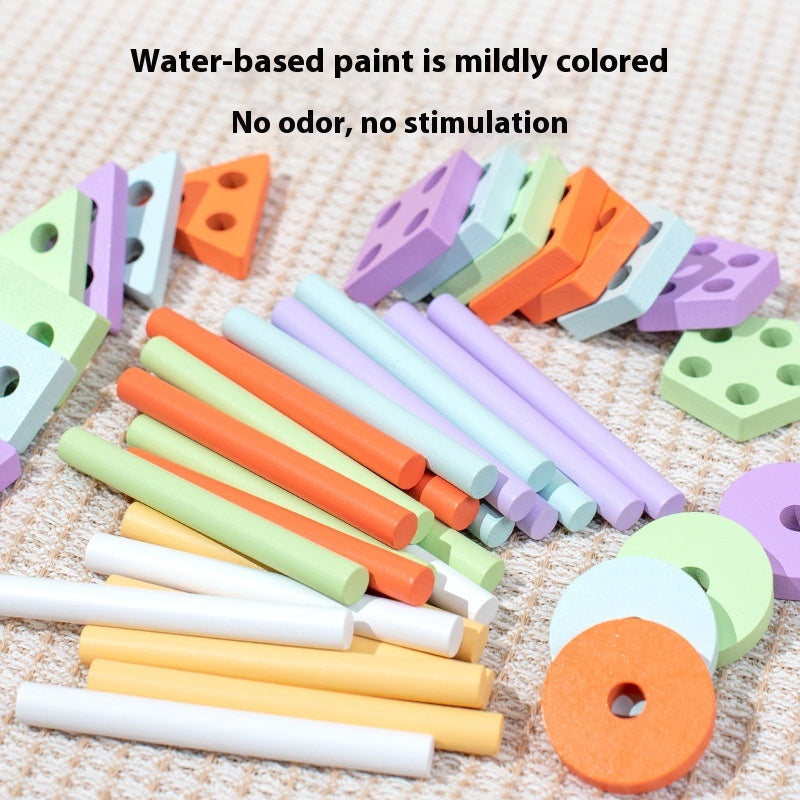 Colorful wooden toys with text about water-based paint on a textured surface
