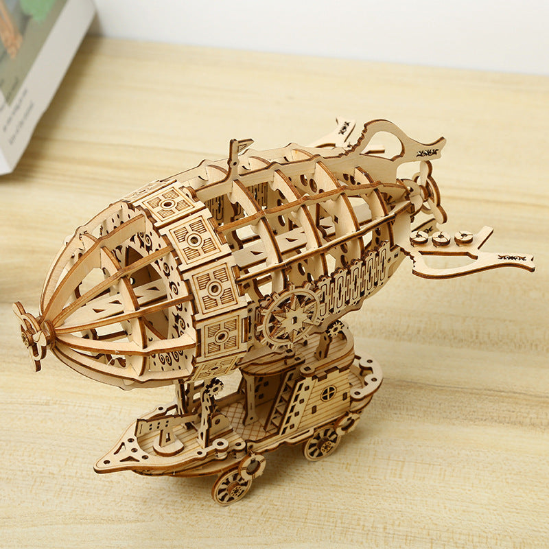 Wooden model ship on a wooden surface