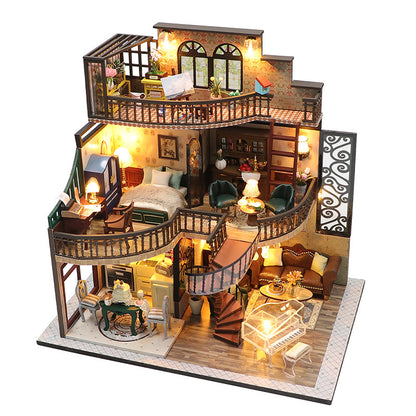 Detailed model of a dollhouse with illuminated interior