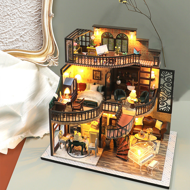 Detailed model of a multi-story house with various rooms and furniture.