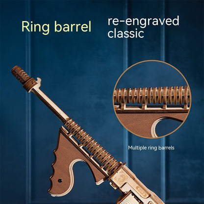 Decorative rifle with ring barrel design on a blue background