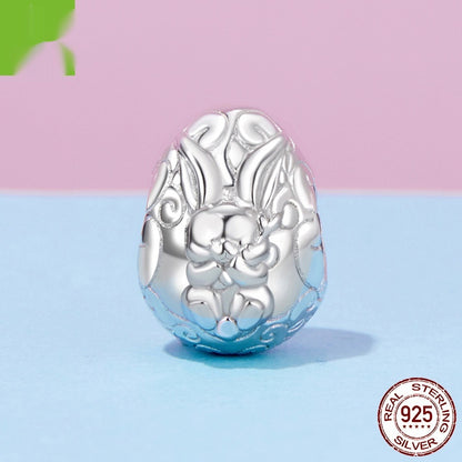 Egg shaped bead with engraved bunny in 925 silver