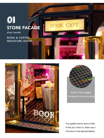 Miniature model of a book cafe with 'Book Cafe' sign and interior view.