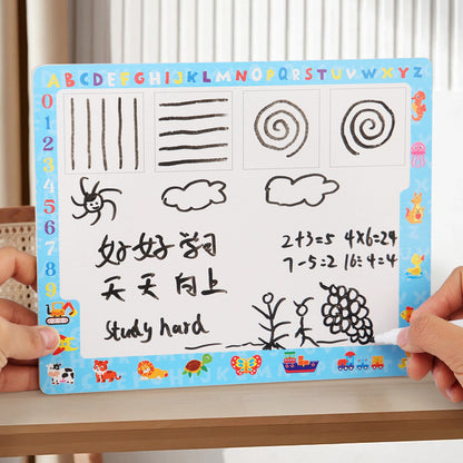 Children's educational board with drawings and text held by a person