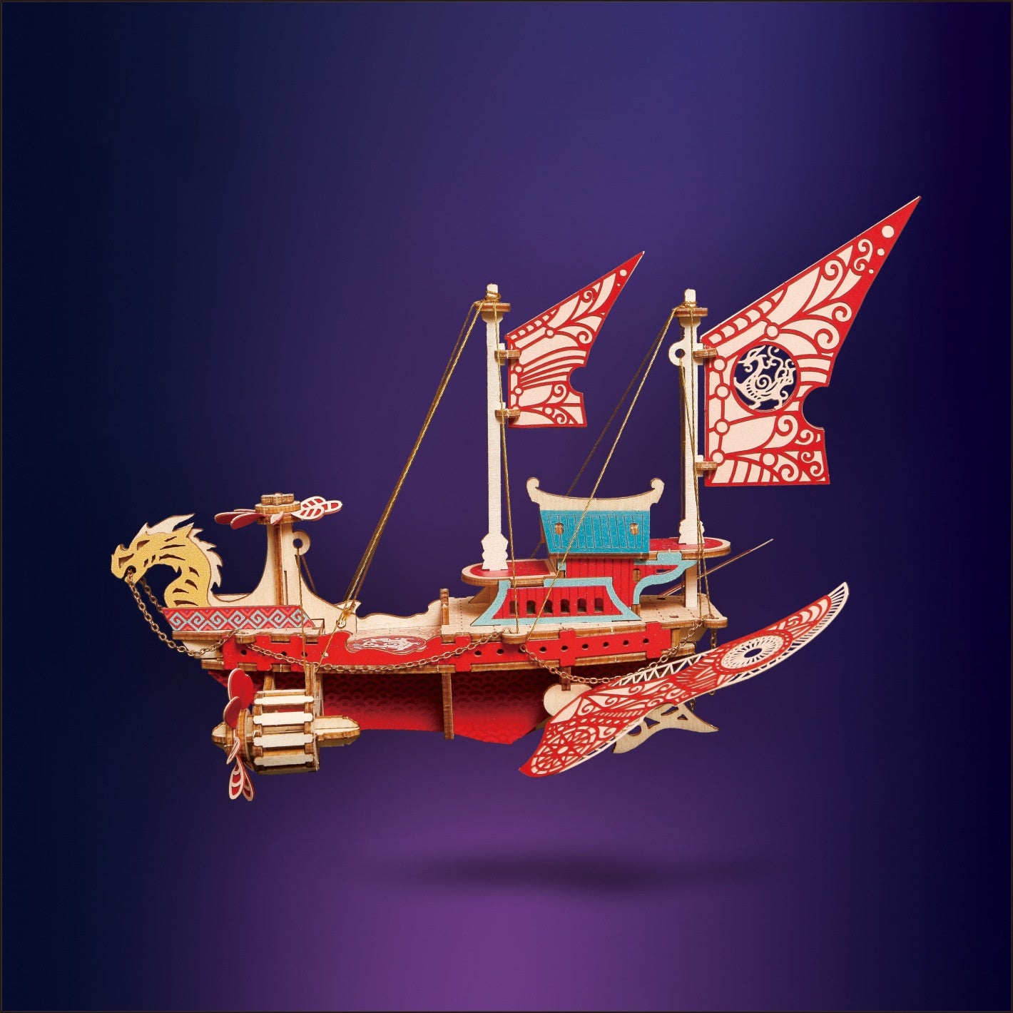 Decorative ship model with red and gold details on a purple background