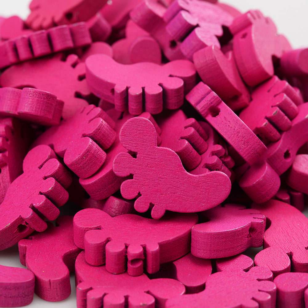 Close-up of pink plastic animal shapes on a white background