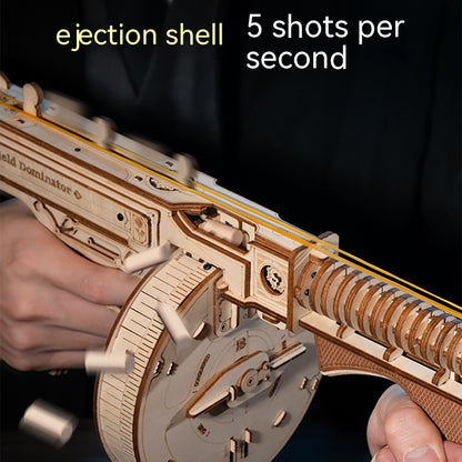 Wooden model gun with ejection shell mechanism and text '5 shots per second' on a dark background
