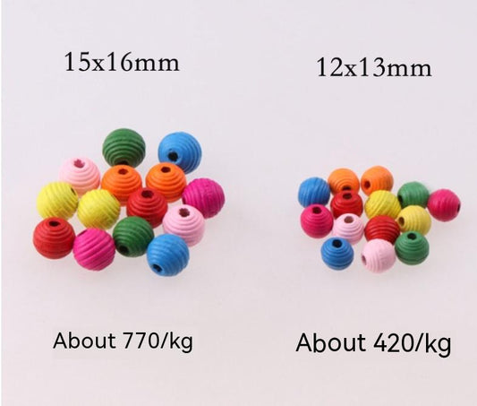 Colorful beehive-shaped beads on a white background