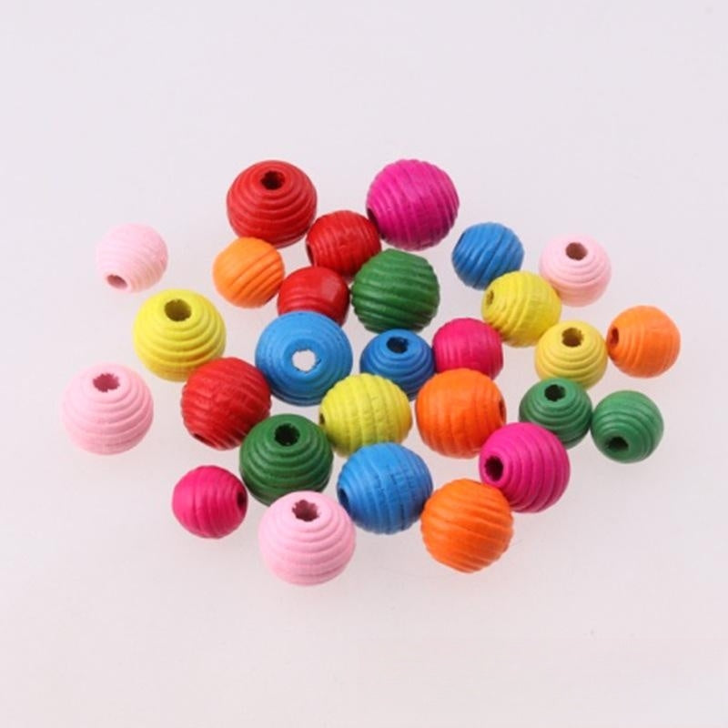 Colorful beaded toys on a white background